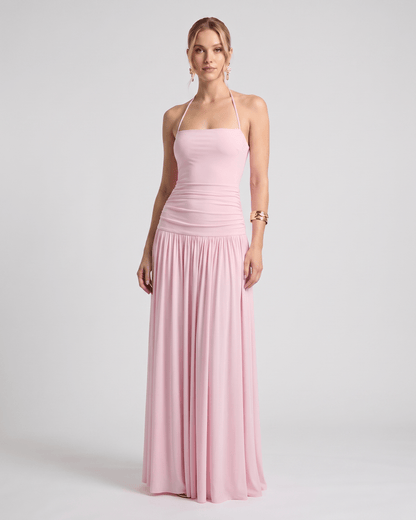 Elara Maxi Dress in soft pink stretch jersey, halter neck design with a flowing skirt, by Lauven.