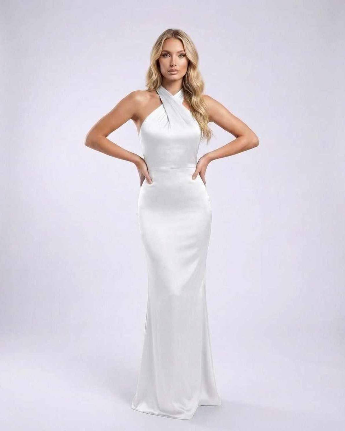 Elara Maxi Dress featuring a white satin finish, halter neck, open back, and elegant design by Lauven.