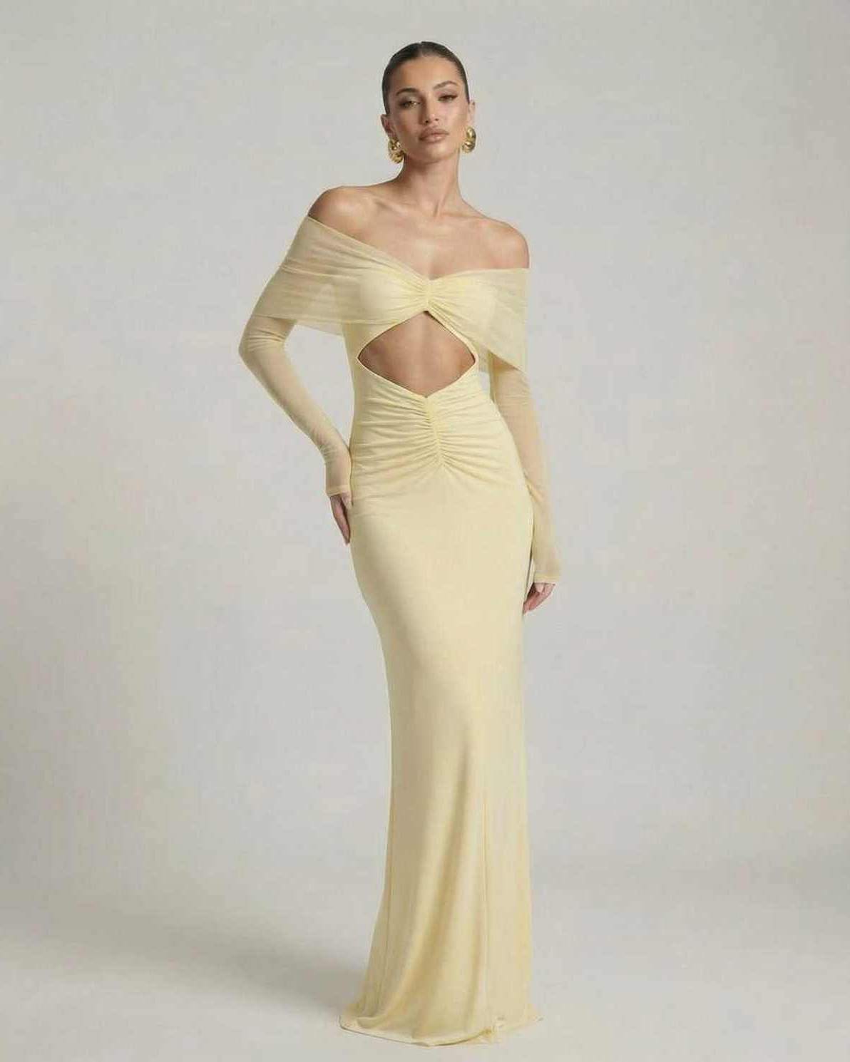 Elara Maxi Dress featuring yellow color, off-shoulder mesh sleeves, ruched cut-out design by Lauven.