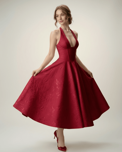 Elara Midi Dress by Lauven – Elegant midi dress with halter neckline, structured fit, and A-line silhouette in rich red.