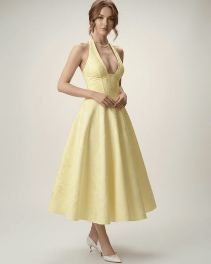 Elara Midi Dress - Elegant halter A-line silhouette, structured fit, and sophisticated yellow color by Lauven.