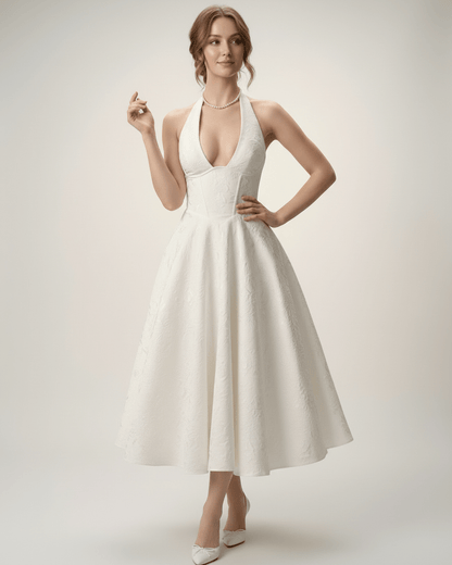 Elara Midi Dress by Lauven, elegant midi dress with halter neckline and flattering A-line silhouette.
