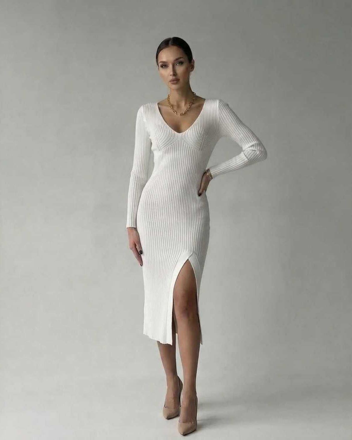Elara Midi Dress by Lauven, elegant white ribbed knit V-neck dress with slit, perfect for modern style.