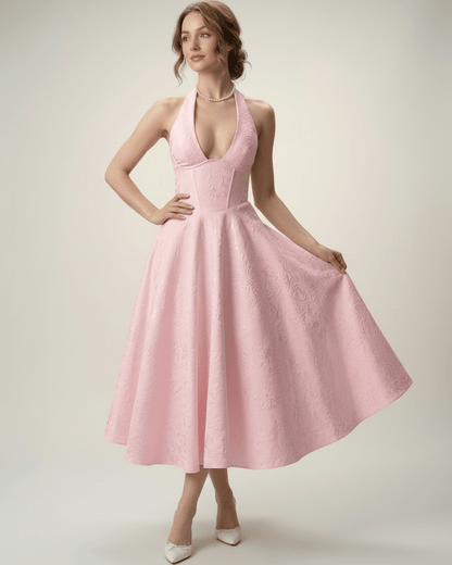 Elara Midi Dress with a halter neckline and A-line silhouette, offering elegance and sophistication by Lauven.