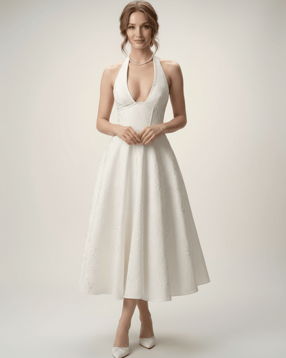 Elara Midi Dress - Elegant midi dress with halter neckline, structured A-line silhouette by Lauven, perfect for special occasions.