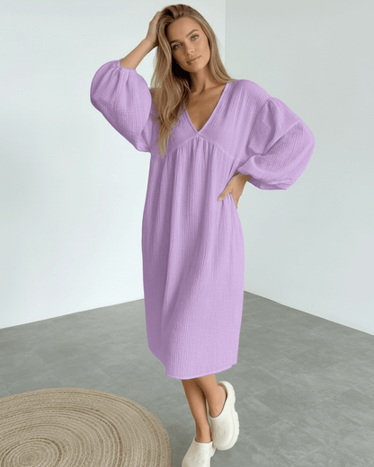 Elara Midi Dress in lavender cotton with puff sleeves, offering a soft and feminine silhouette by Lauven.