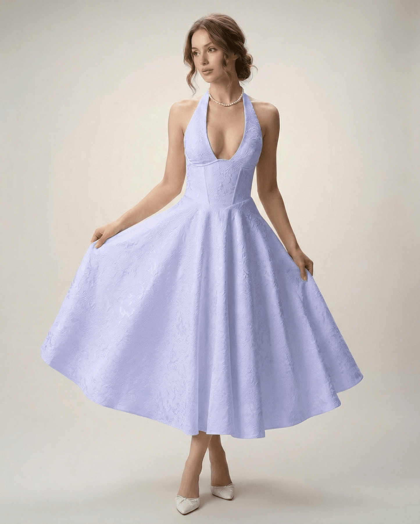 Elara Midi Dress in soft lavender, featuring halter neckline and A-line silhouette, exuding elegance by Lauven.