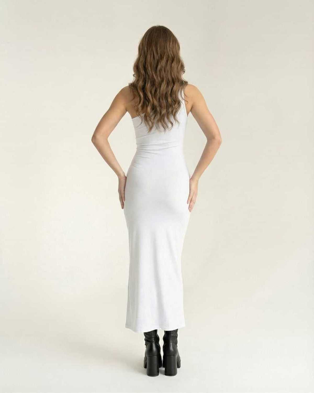 Elara Midi Dress - Back view of white bodycon dress by Lauven showcasing sculpted silhouette.