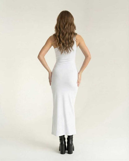 Elara Midi Dress - Back view of white bodycon dress by Lauven showcasing sculpted silhouette.