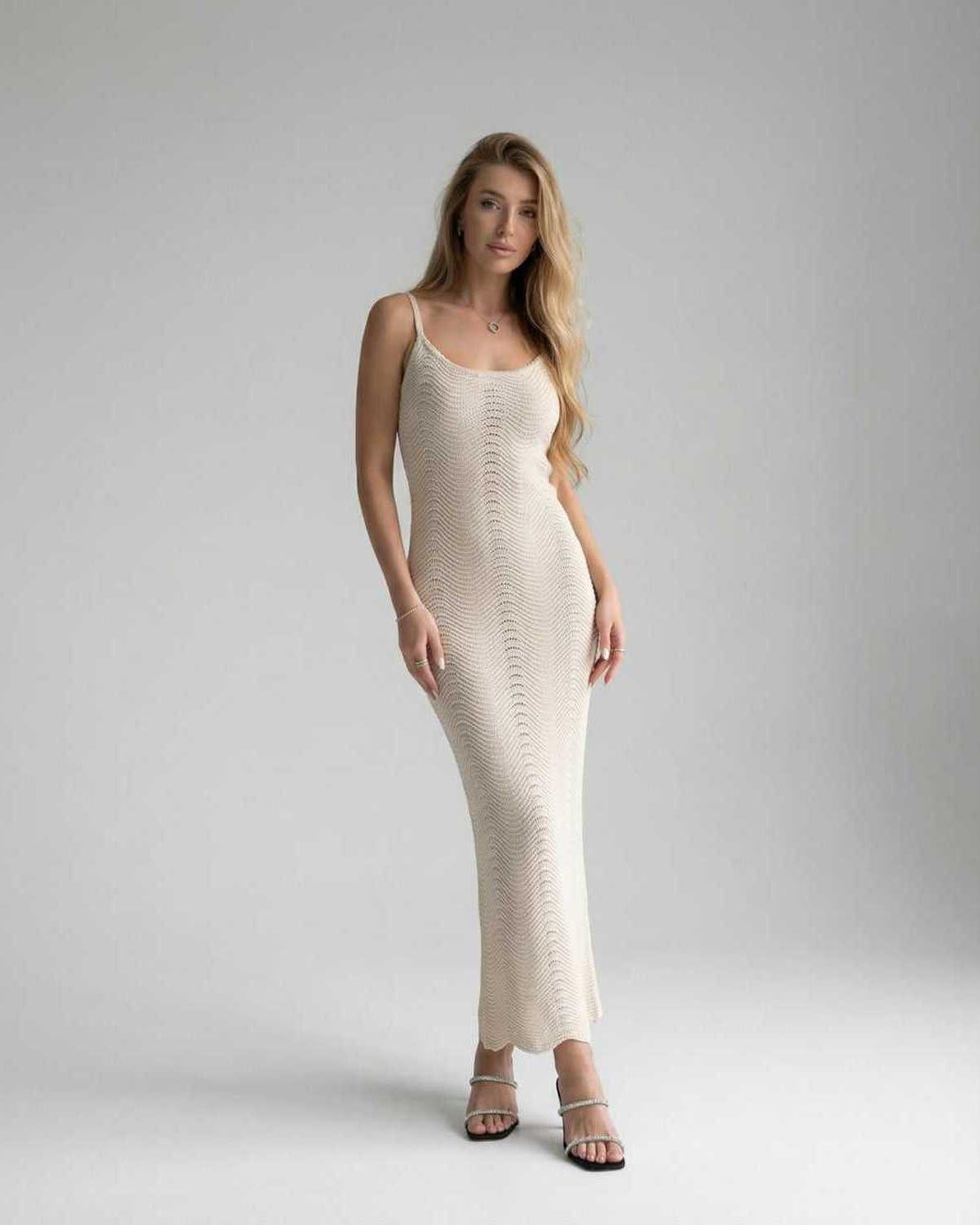 Elara Midi Dress — White bodycon sleeveless dress by Lauven, featuring a sleek, modern silhouette perfect for day-to-evening wear.