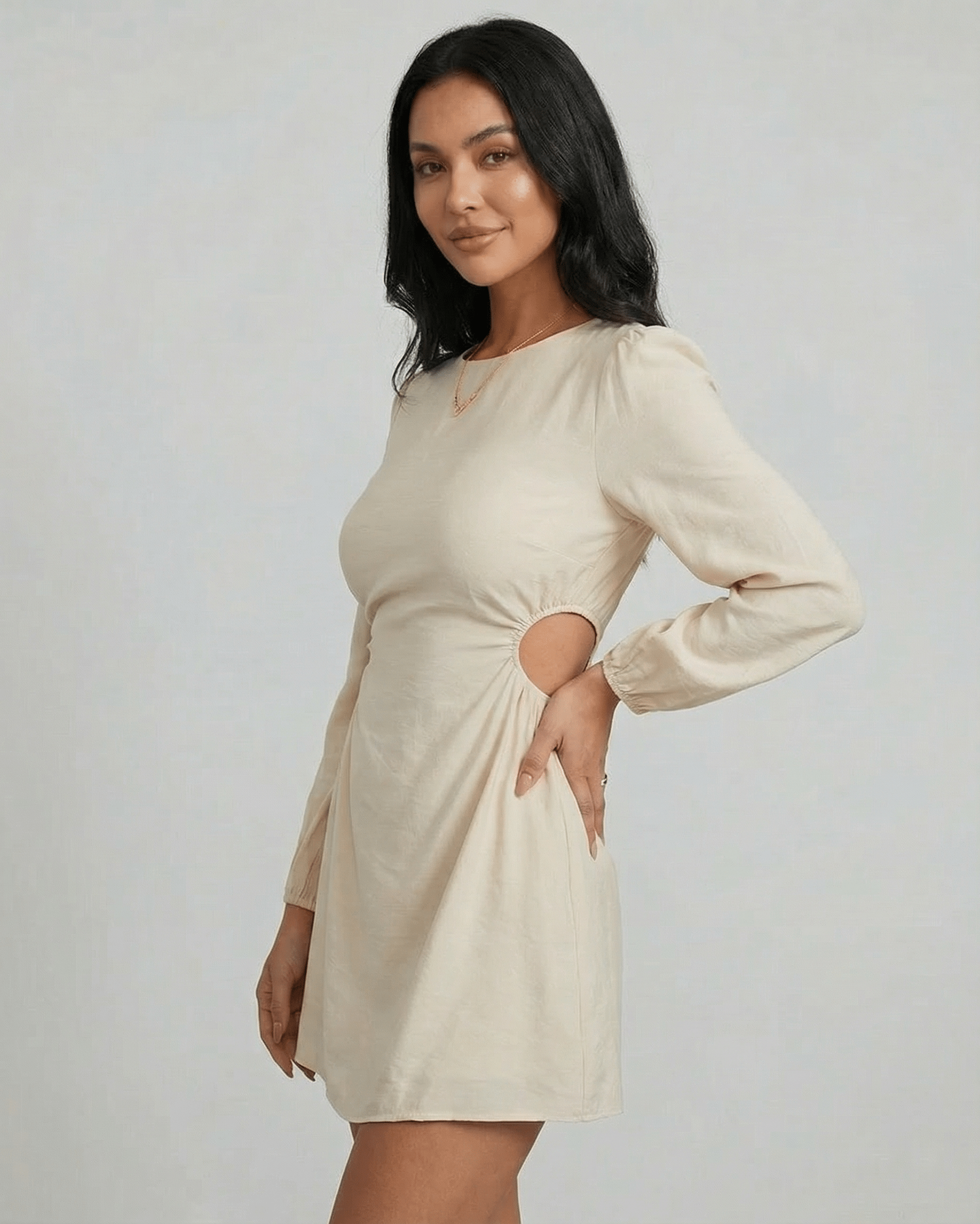 Elara Mini Dress by Lauven featuring a long sleeve A-line silhouette with cut-out detail, perfect for autumn and winter styling.