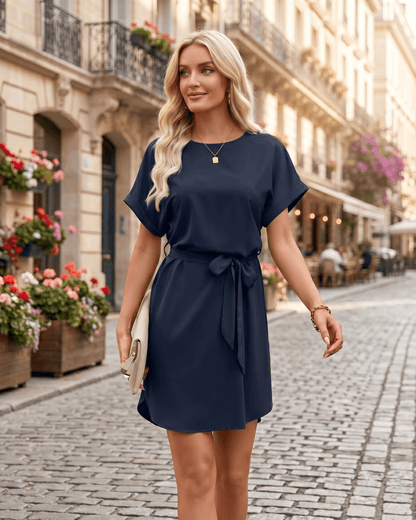 Elara Mini Dress by Lauven, featuring smooth woven fabric, round neckline, self-tie waist belt in a relaxed silhouette.