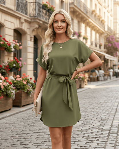Elara Mini Dress in olive green with self-tie waist belt, round neckline, featuring smooth woven fabric by Lauven.