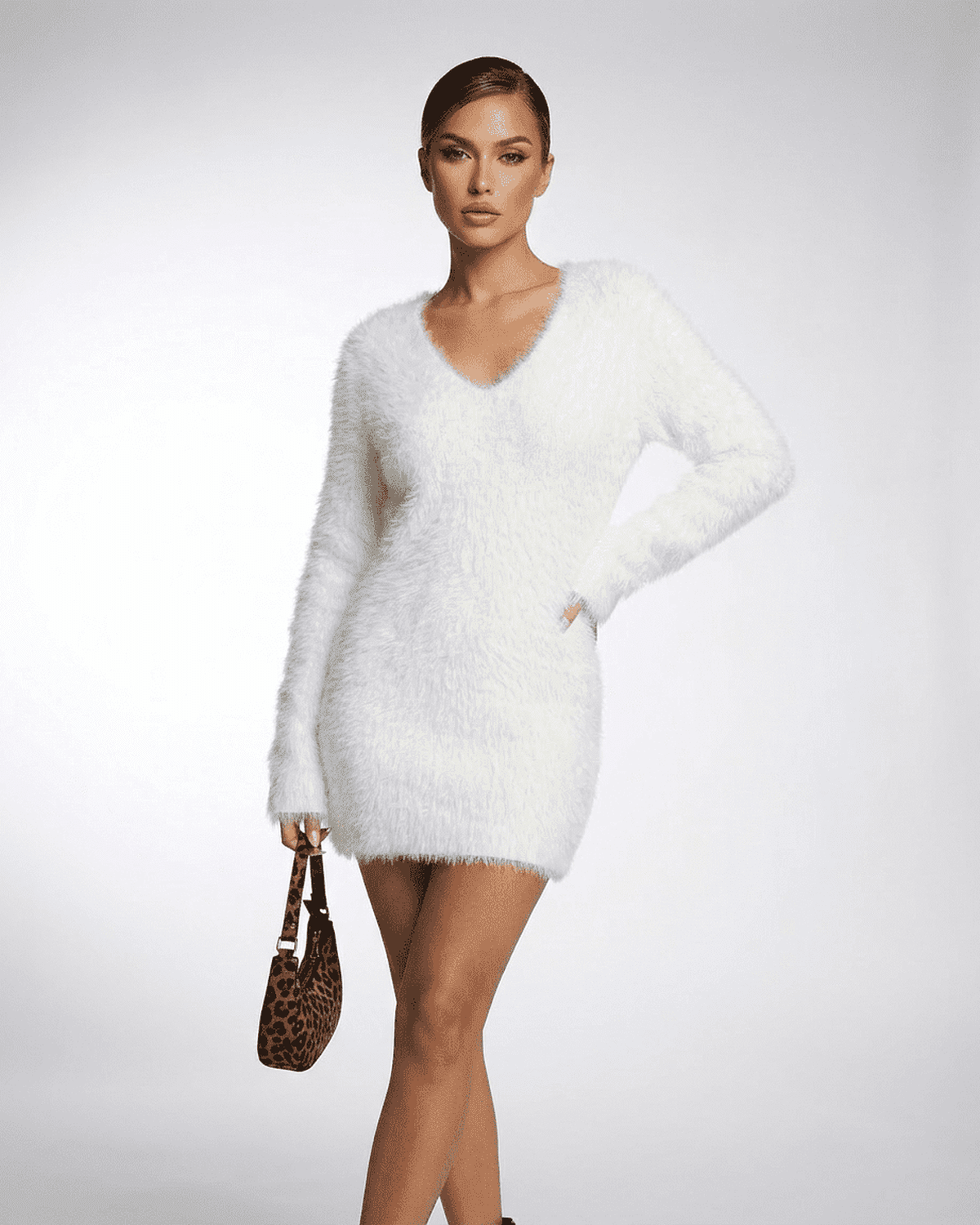 Elara Sweater by Lauven in white fuzzy plush knit, featuring a V-neckline and elegant style.