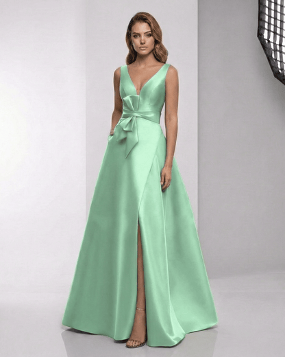 Elaris Maxi Dress in mint green satin, featuring A-line silhouette and modern wrap detail by Lauven.