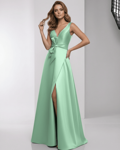 Elaris Maxi Dress in soft mint green satin with A-line silhouette and modern wrap detail by Lauven.