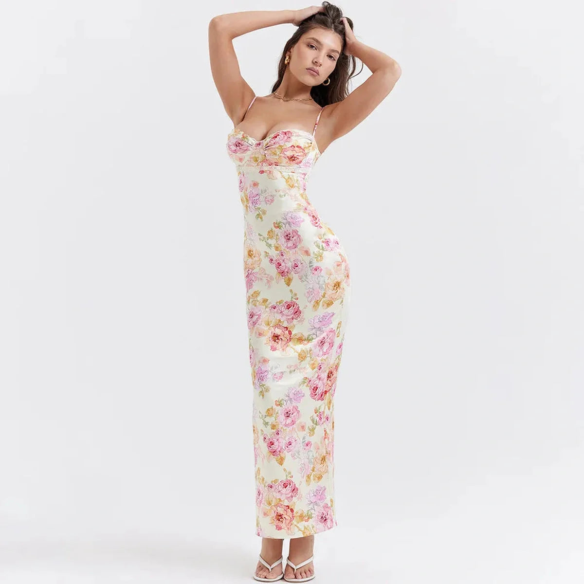 Elodie Maxi Dress featuring a stunning floral print, perfect for summer weddings or special occasions, elegantly fitting the body.