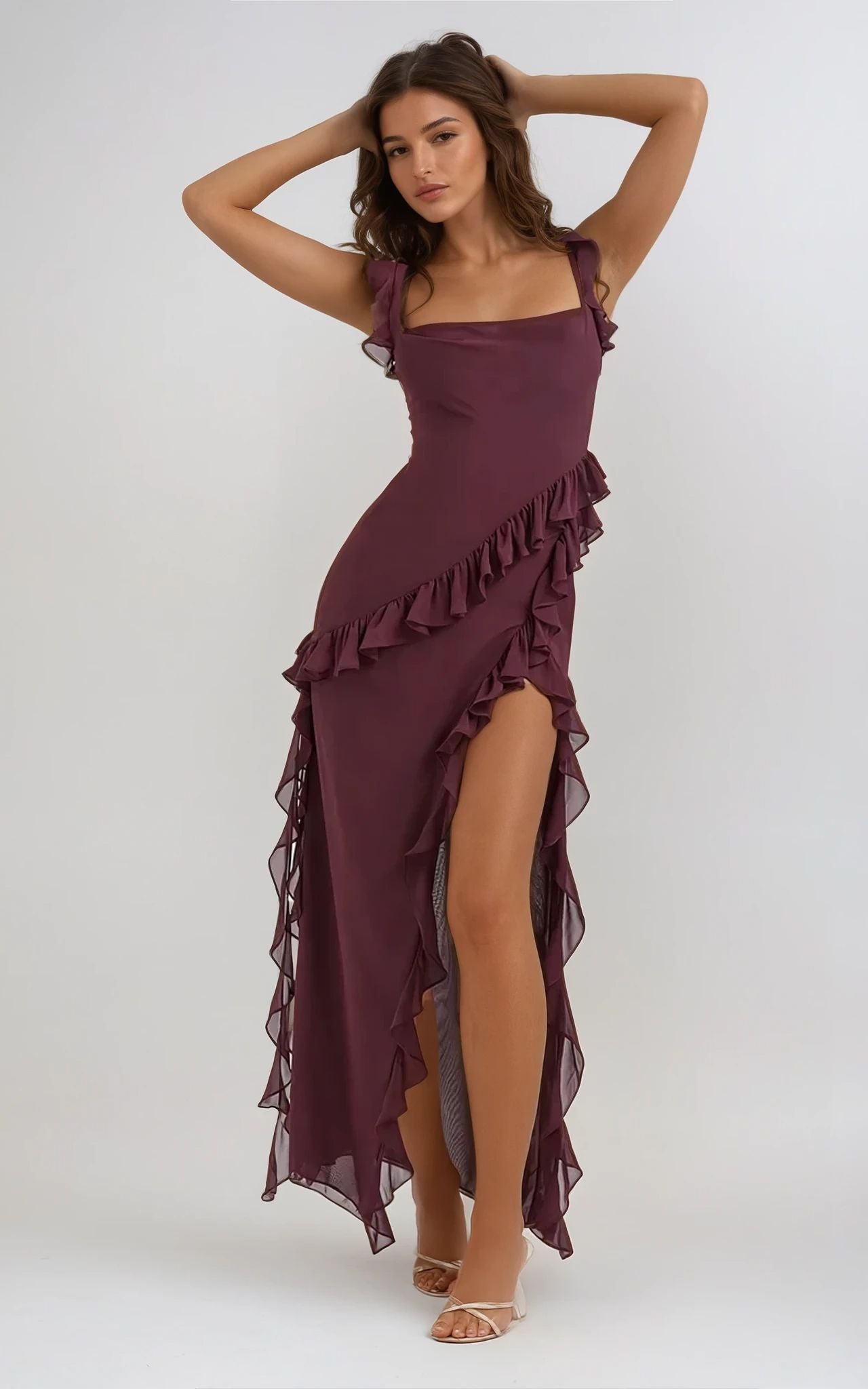 Elodie Women's Ruffled Maxi Dress in deep burgundy, featuring an asymmetrical hem and high slit, perfect for weddings and summer events.