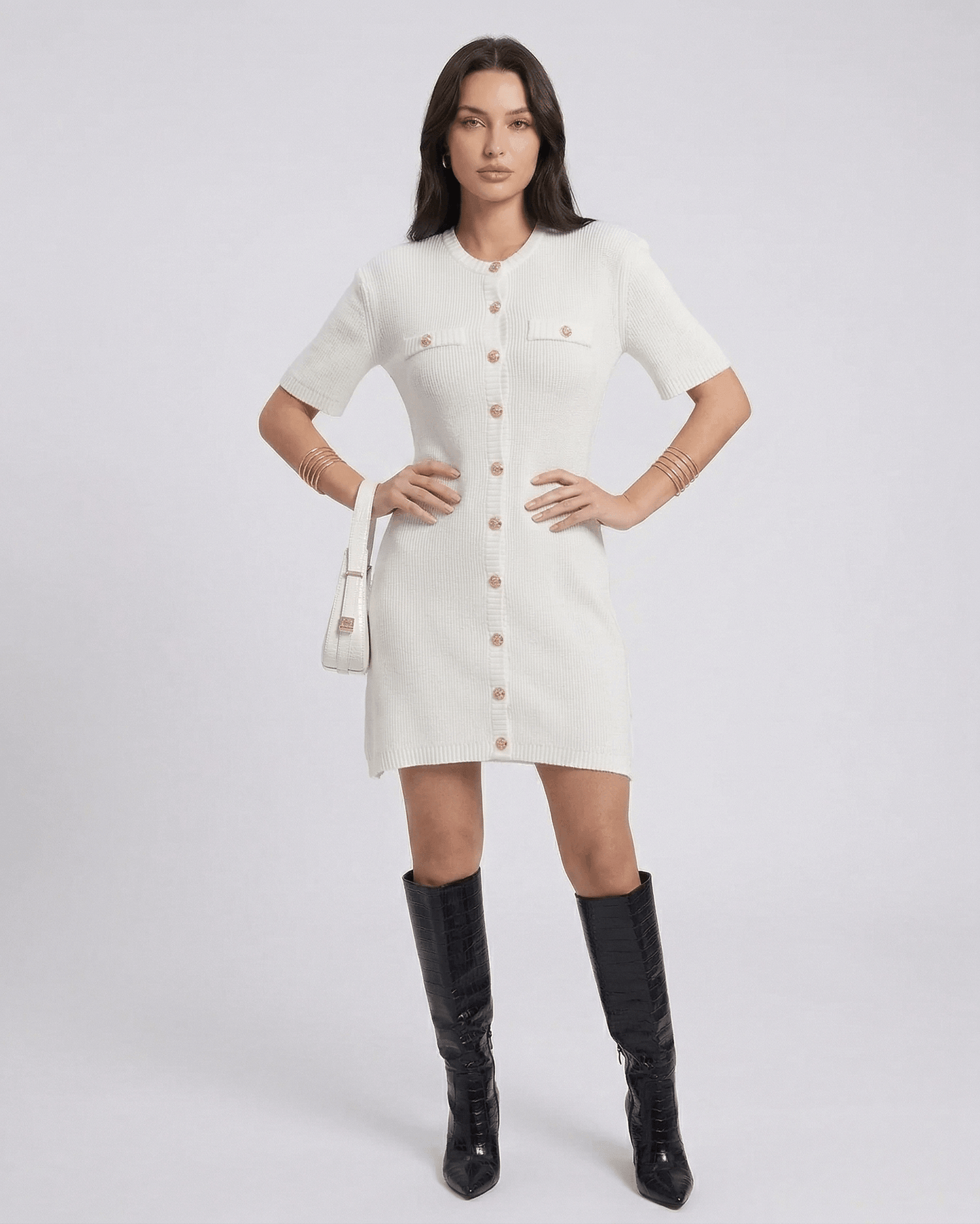 Model wearing Elysia Mini Dress by Lauven featuring button closure and casual knit design.