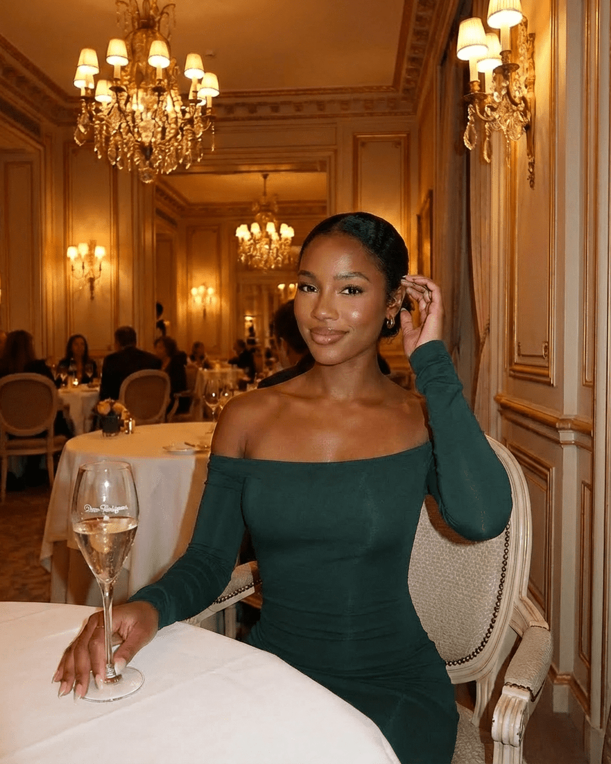 Emerald Maxi Dress by Lauven, styled elegantly in a chic restaurant setting.