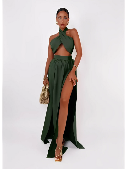 Emerald Muse Set featuring a halter crop top and a maxi skirt with thigh-high slit in deep green, perfect for summer occasions.