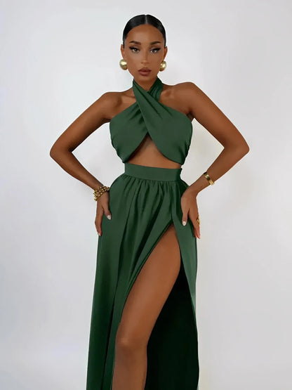 Emerald Muse Set featuring a halter crop top and thigh-high slit maxi skirt, perfect for summer events.