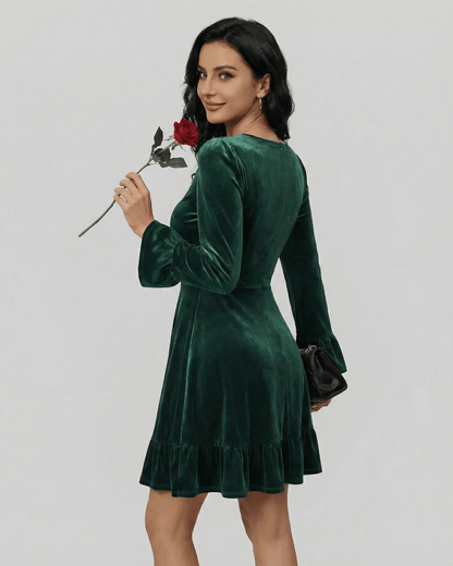 Emeraldia Mini Dress by Lauven, long sleeve, A-line silhouette in deep green with velvety texture.