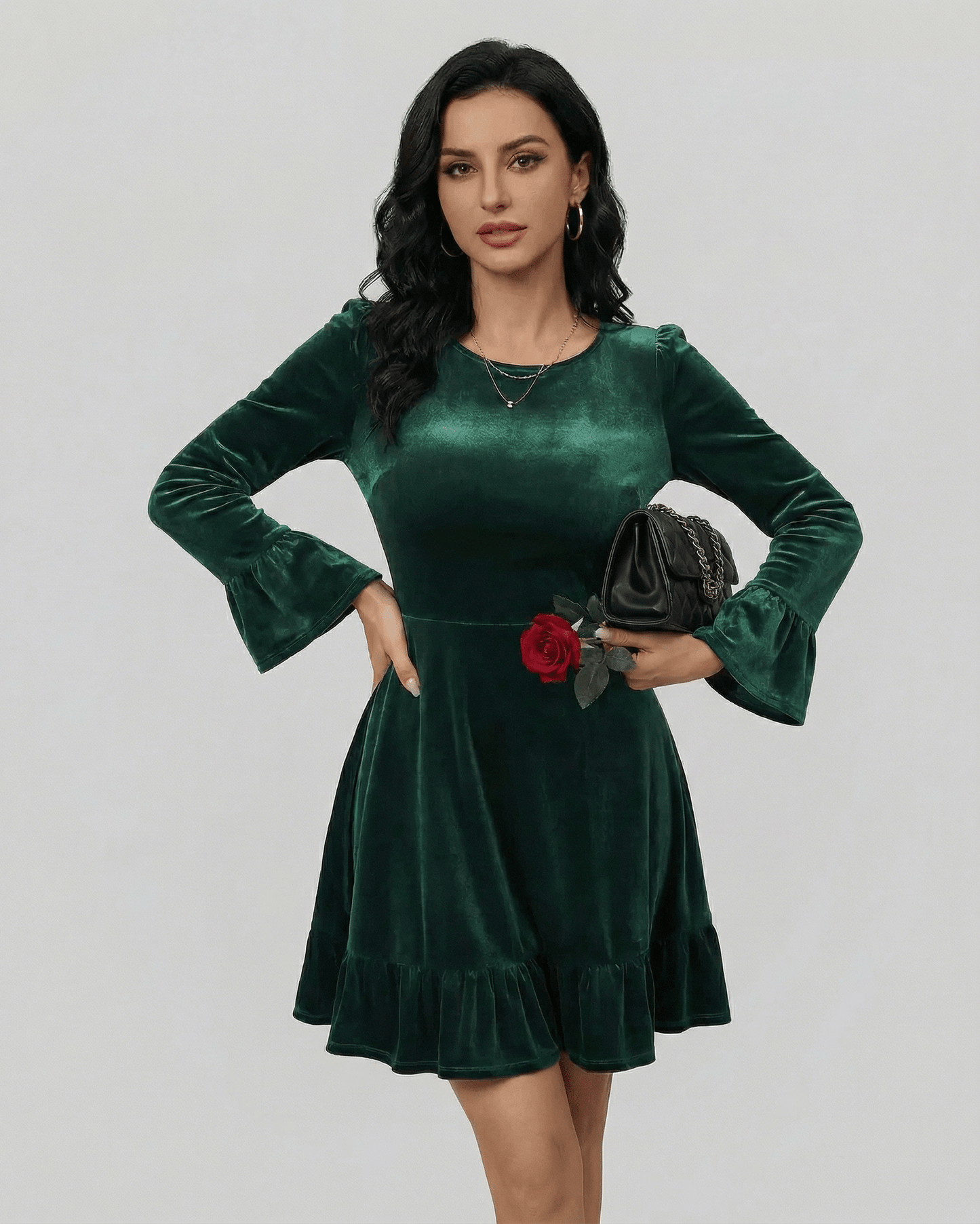 Emeraldia Mini Dress by Lauven in deep green with long sleeves and ruffled hem, perfect for autumn and winter styling.