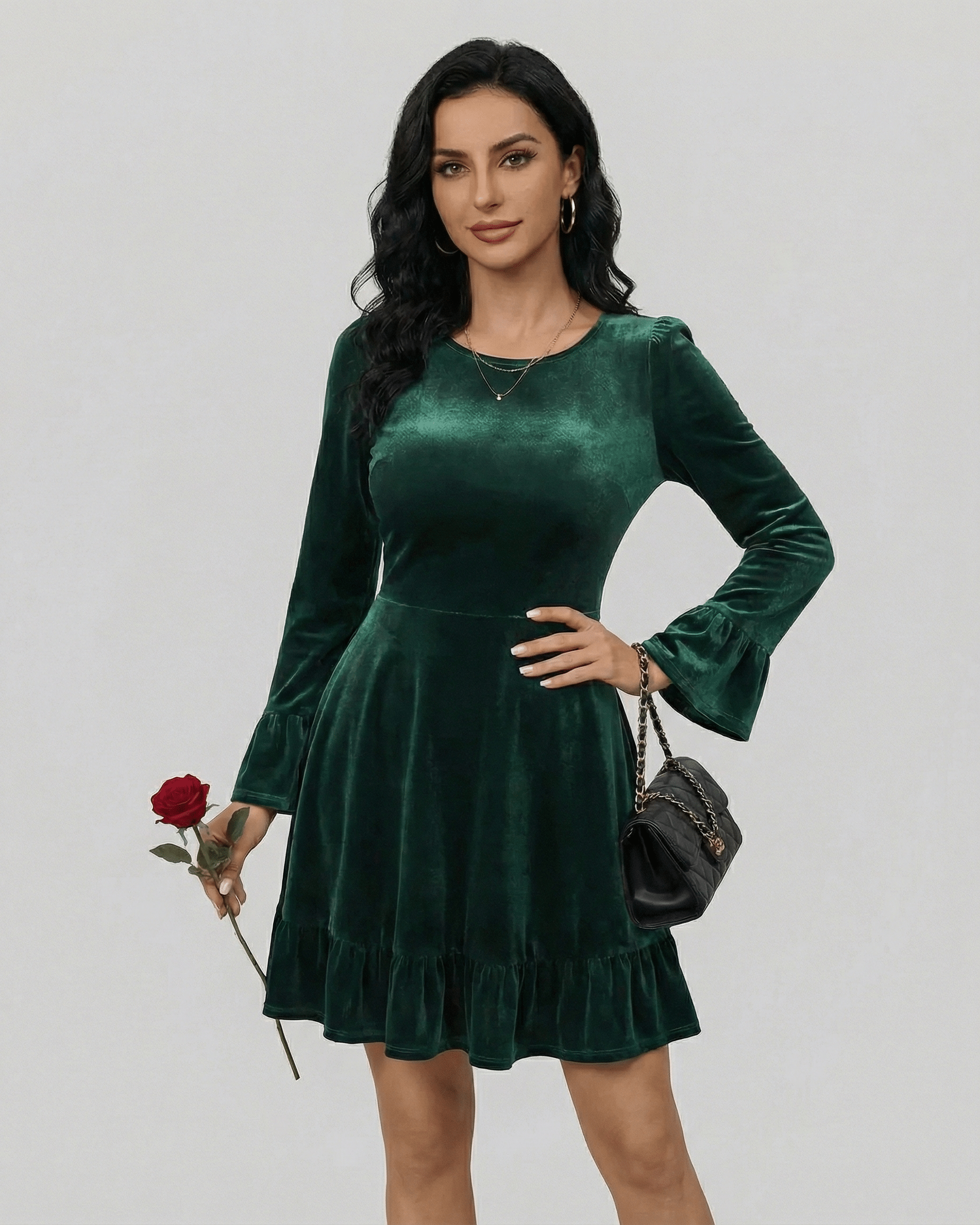 Emeraldia Mini Dress by Lauven, featuring long sleeves, A-line silhouette, and deep green velvet fabric.