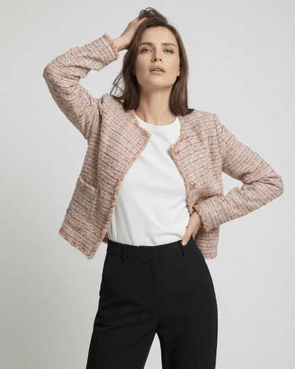 Model wearing the Florence Jacket by Lauven, a stylish women's tweed jacket in a multitone weave.