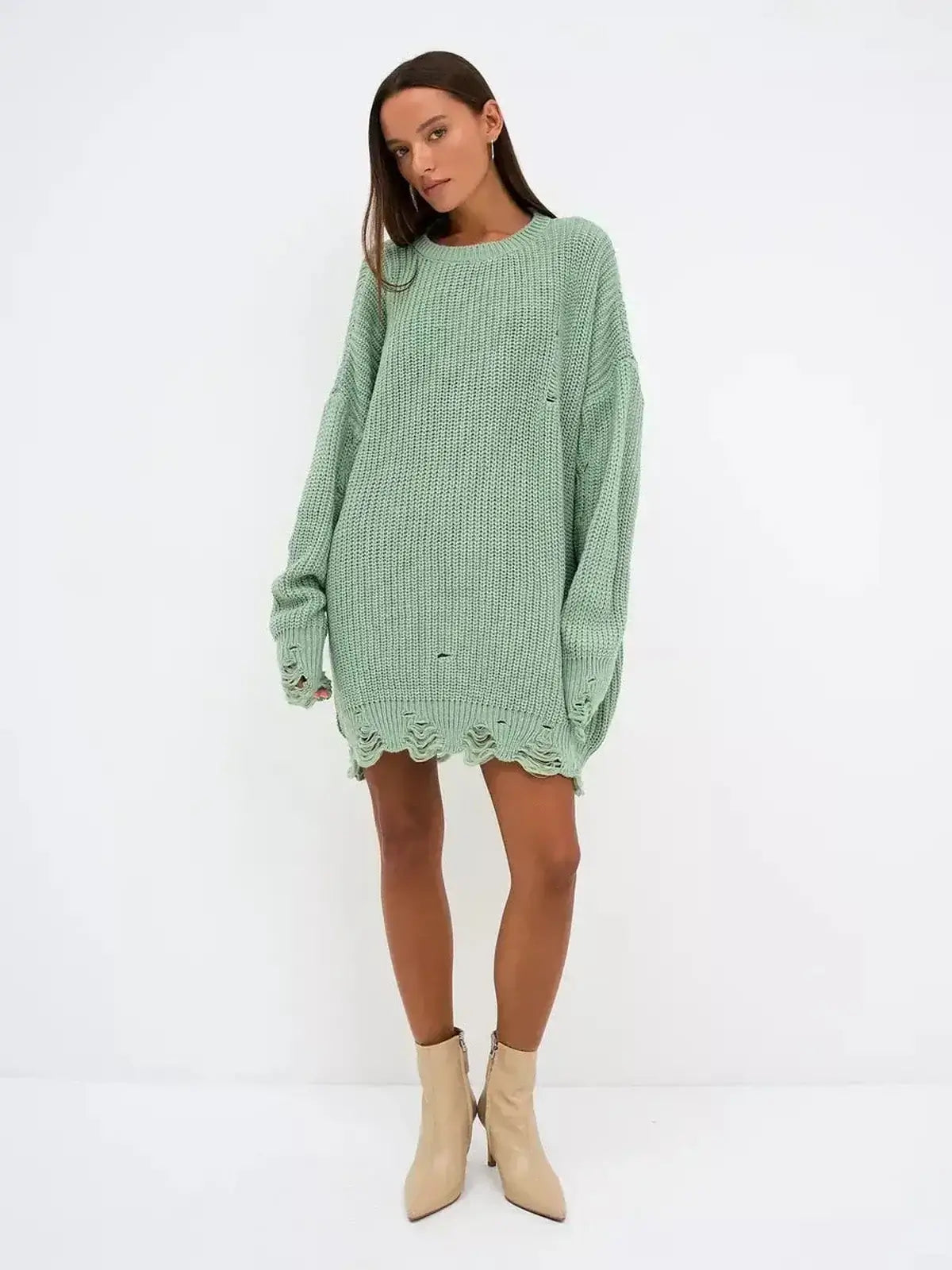 Soft mint green oversized Frost Knit Mini sweater dress with distressed accents, perfect for casual outings and summer events.