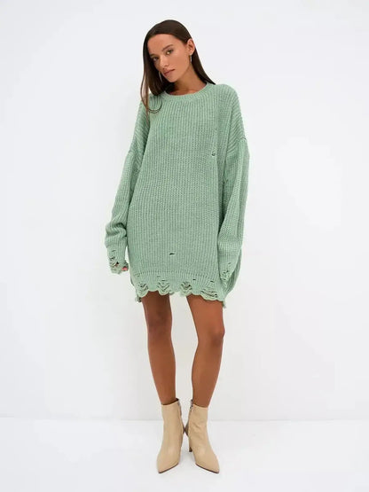 Soft mint green oversized Frost Knit Mini sweater dress with distressed accents, perfect for casual outings and summer events.