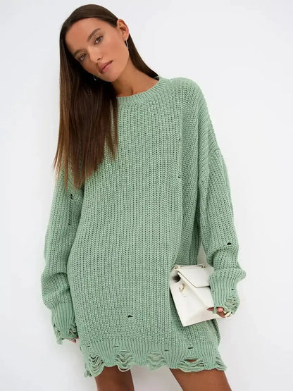 Frost Knit Mini dress in soft mint green; oversized chunky knit with distressed details for a stylish casual look.