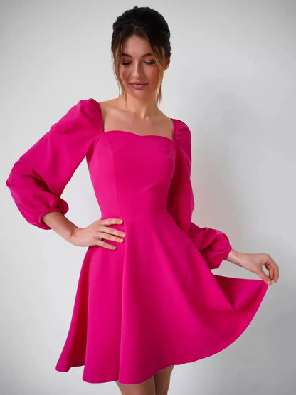 Bright pink mini dress with puff sleeves and square neckline, perfect for weddings or parties.