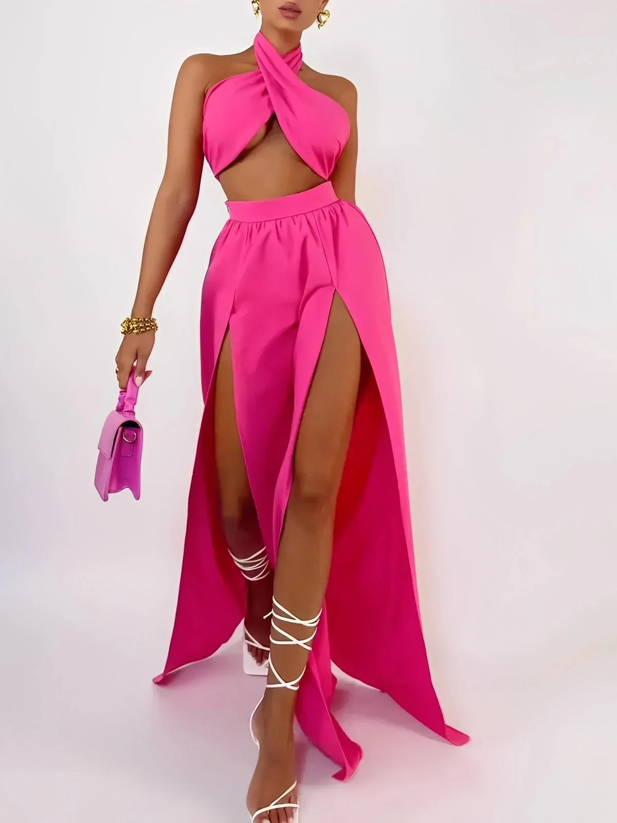 Fuchsia Breeze Set featuring a criss-cross top and flowing skirt, perfect for beach strolls and rooftop soirées.
