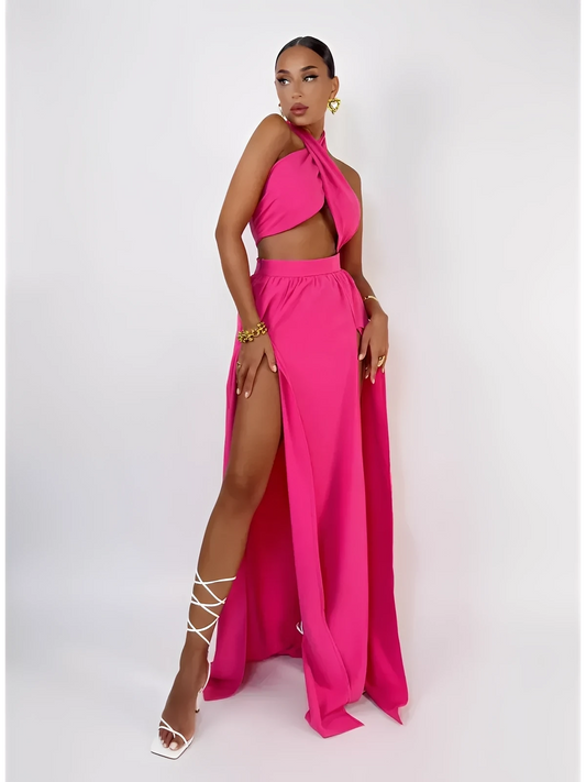 Model showcasing the Fuchsia Breeze Set – Criss-Cross Top and Flowing Skirt, perfect for beach and evening events.