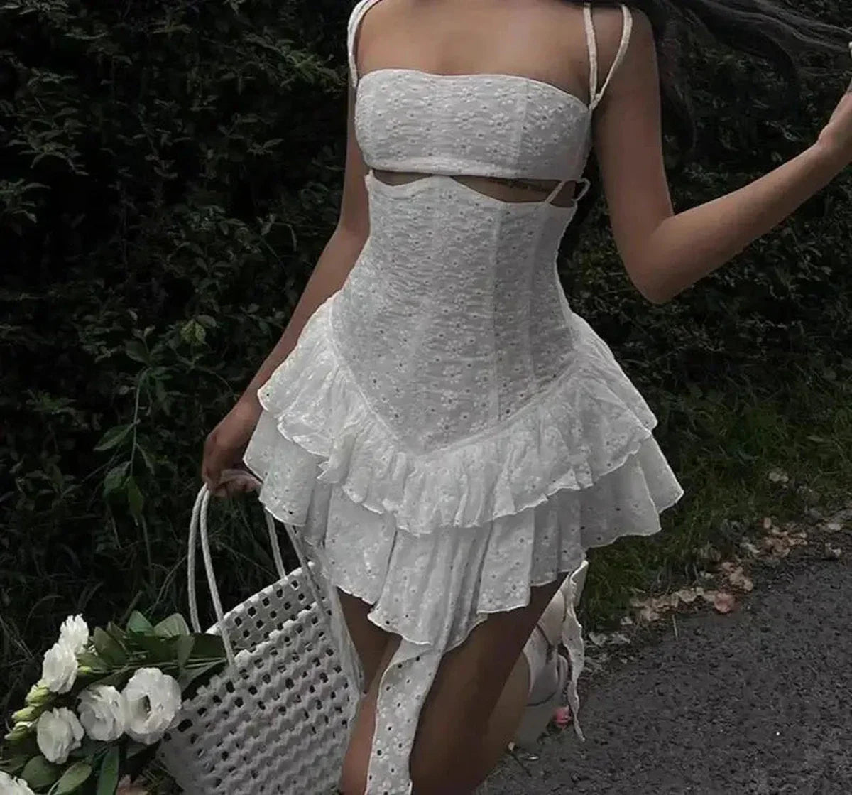 White mini dress with elegant lace detail, perfect for weddings and special occasions.