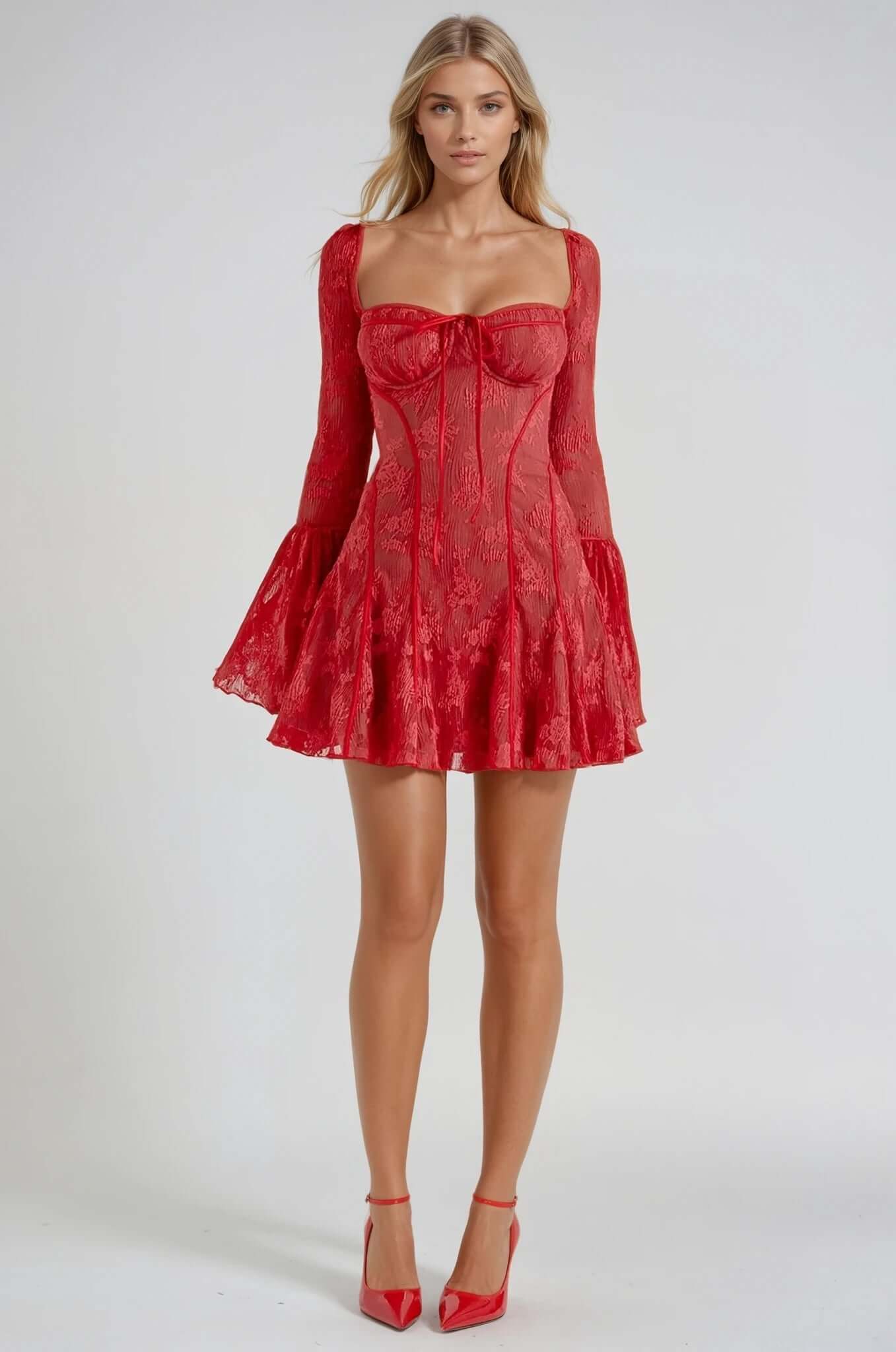 Grace Mini Dress in red lace with flare sleeves, perfect for wedding guests or summer parties, featuring a flattering silhouette.