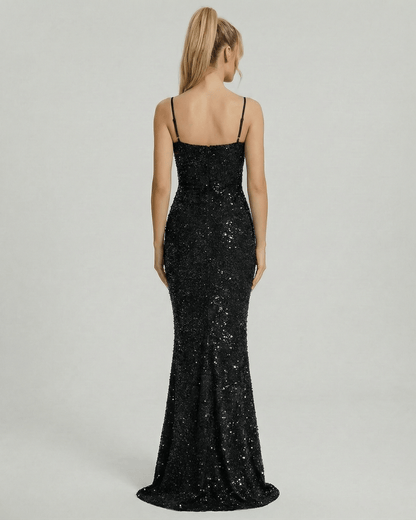 Back view of the Lyra Maxi Dress by Lauven, a glamorous black sequin mermaid gown with spaghetti straps.