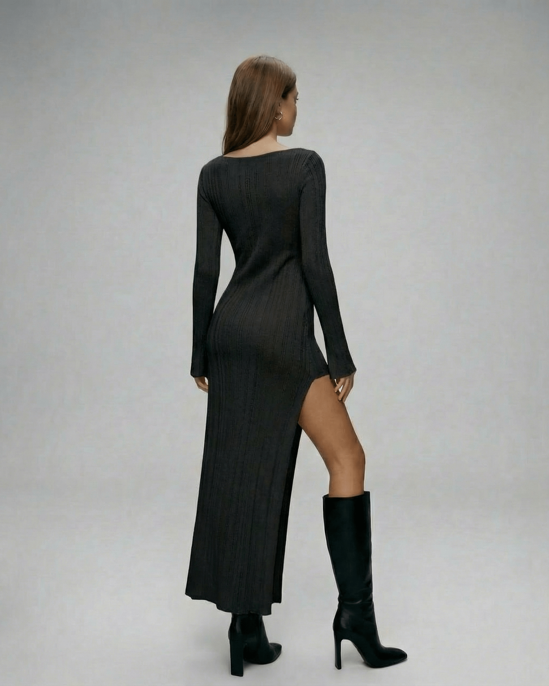 Monaco Midi Dress by Lauven, black long sleeve knit dress with asymmetrical split showcasing elegant silhouette.