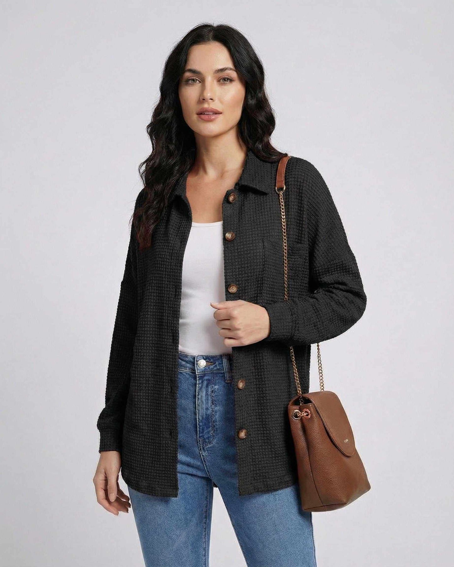 Milano Jacket by Lauven – Women's black jacket in waffle knit with longline fit and button front.