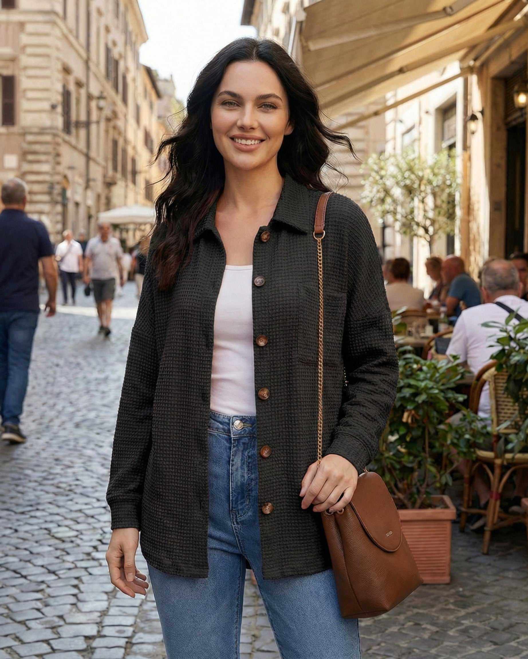 Milano Jacket by Lauven, Women's black jacket in waffle knit, casual longline fit, styled in city street.