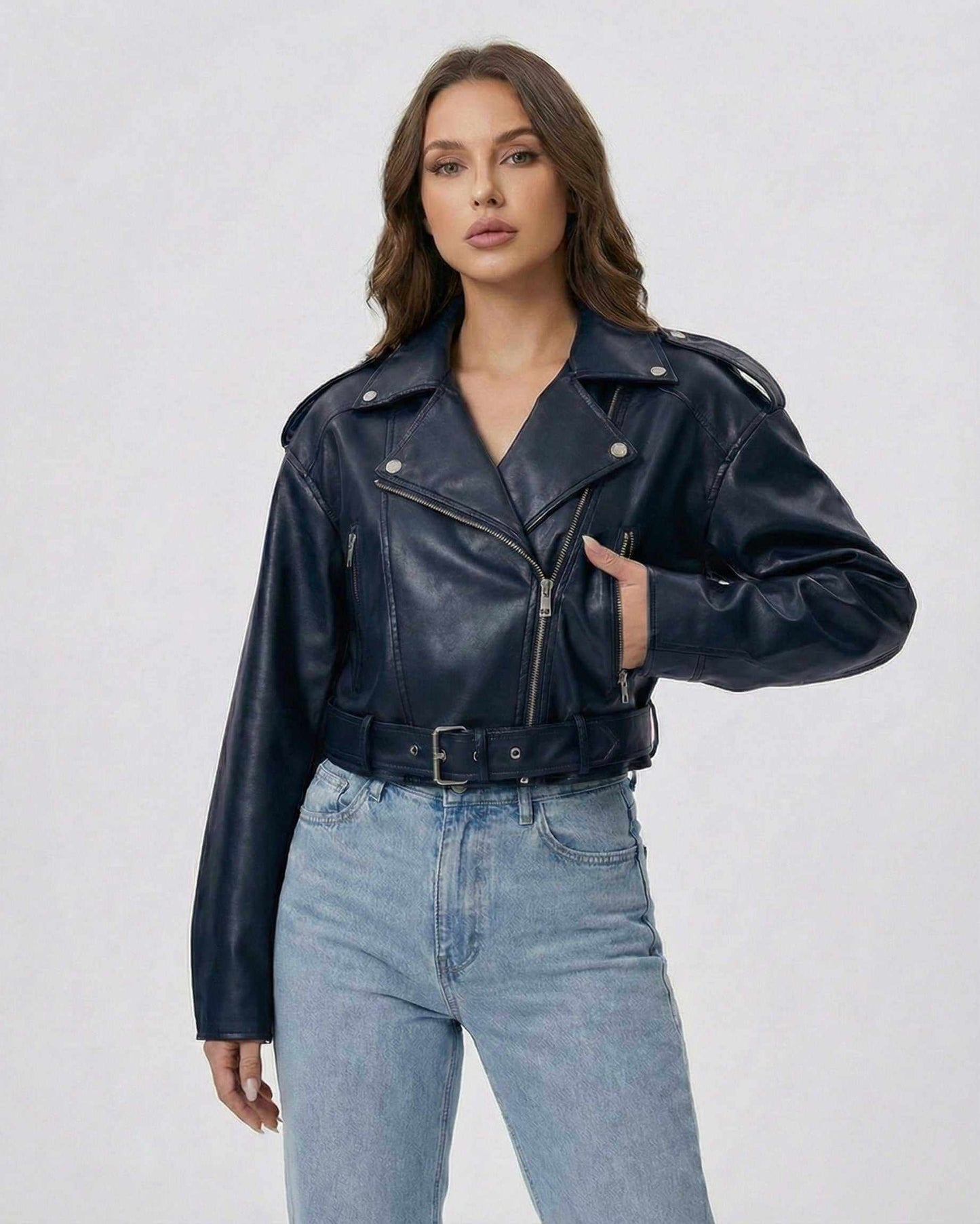 Monaco Jacket by Lauven – Women's blue leather belted moto jacket showing model with stylish pose.