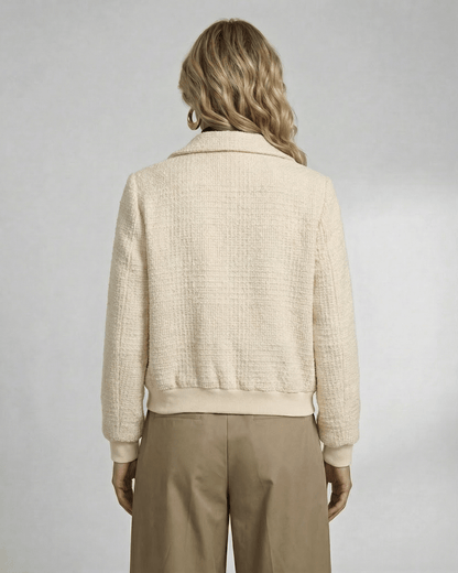 Back view of the Lauven Monaco Jacket, a sophisticated women’s plaid jacket with a structured design and comfortable fit.