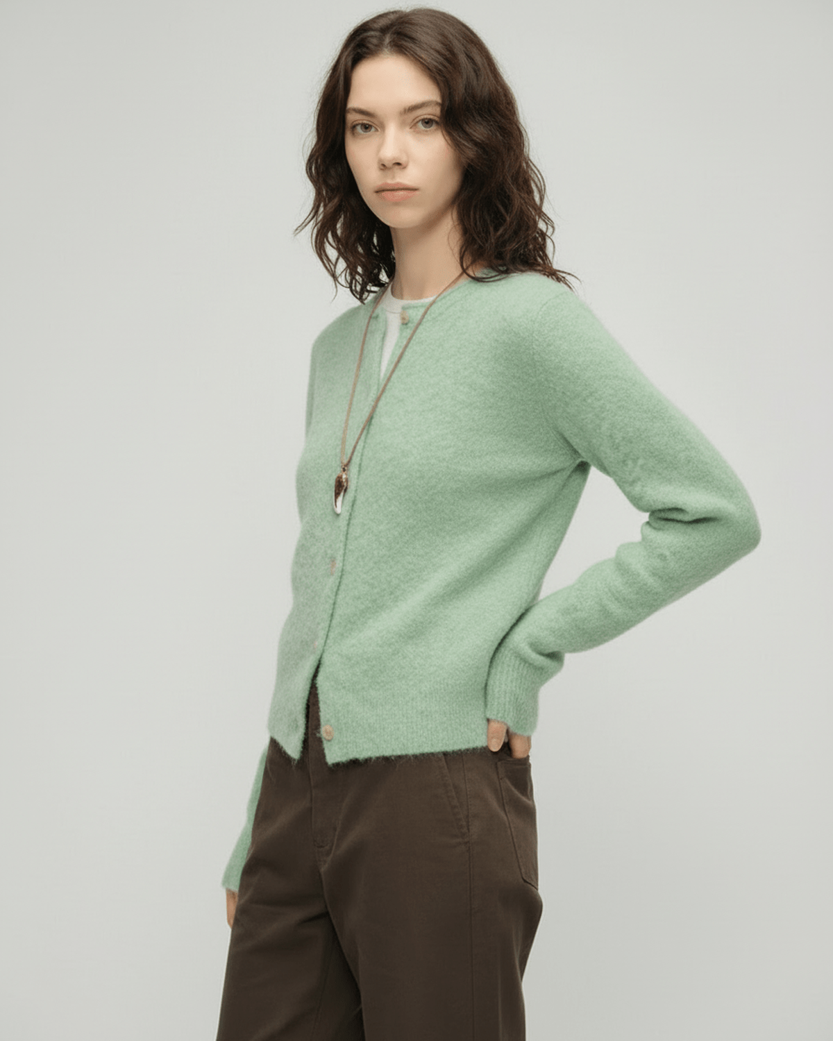 Sage Cardigan by Lauven – Women's green cardigan sweater with round neck and button front.