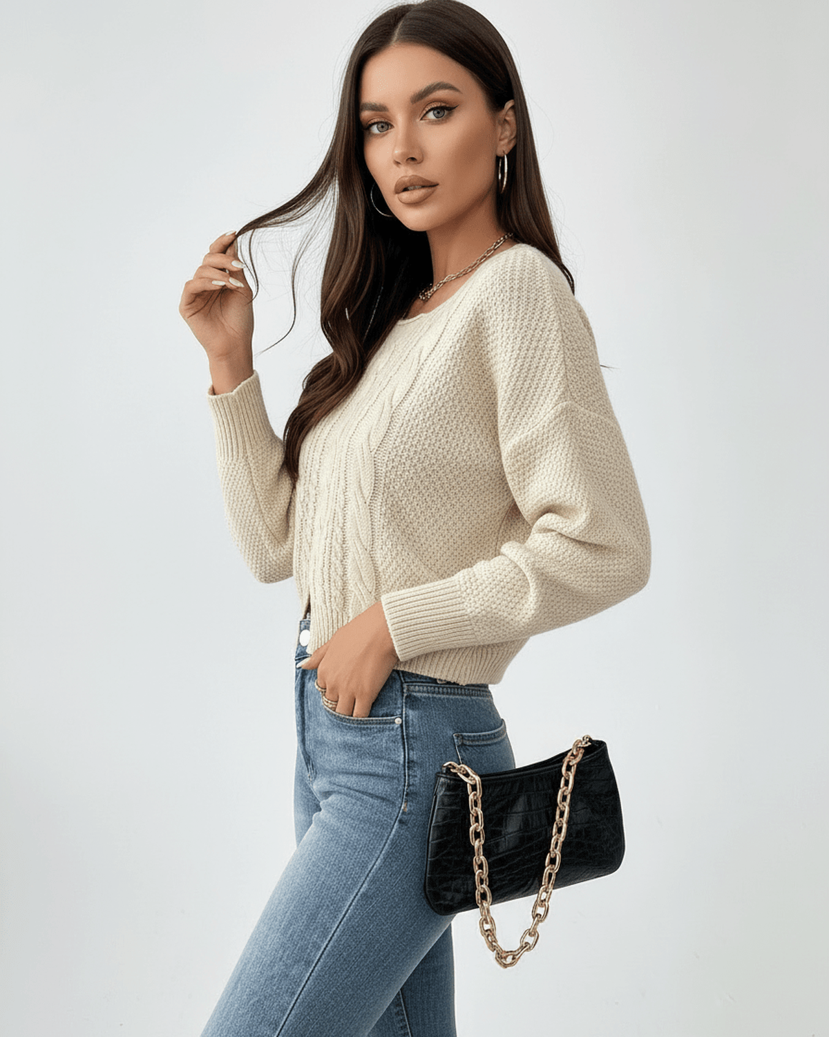 Sienna Sweater by Lauven, women's cable knit sweater in beige with modern cropped silhouette and stylish accessory.