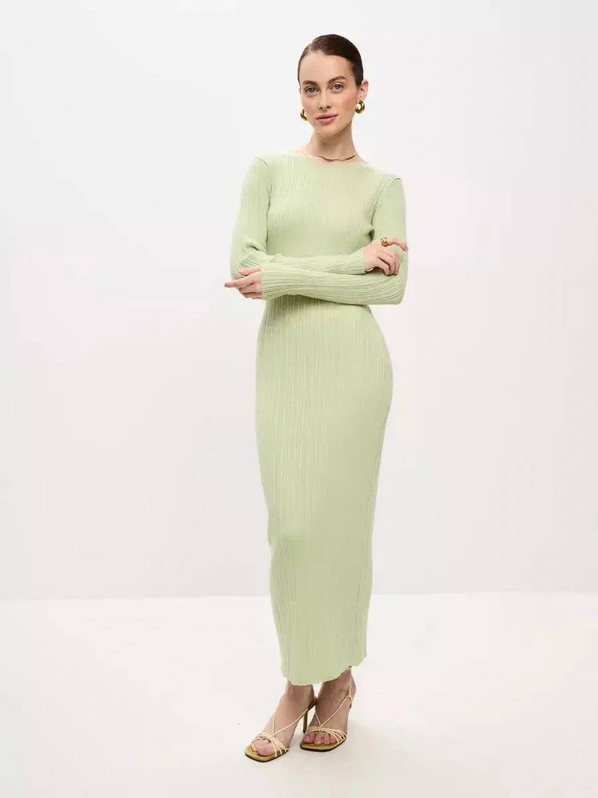 Celery Luxe Maxi Dress in light green, ribbed-knit design with long sleeves and a seamless silhouette.