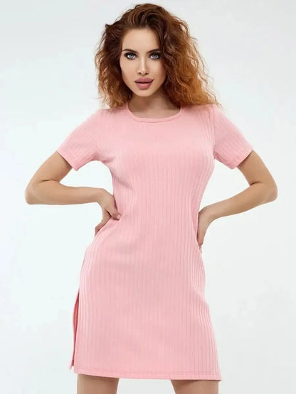Blush Slash pink mini dress featuring a ribbed knit fabric, short sleeves, and a figure-flattering silhouette.
