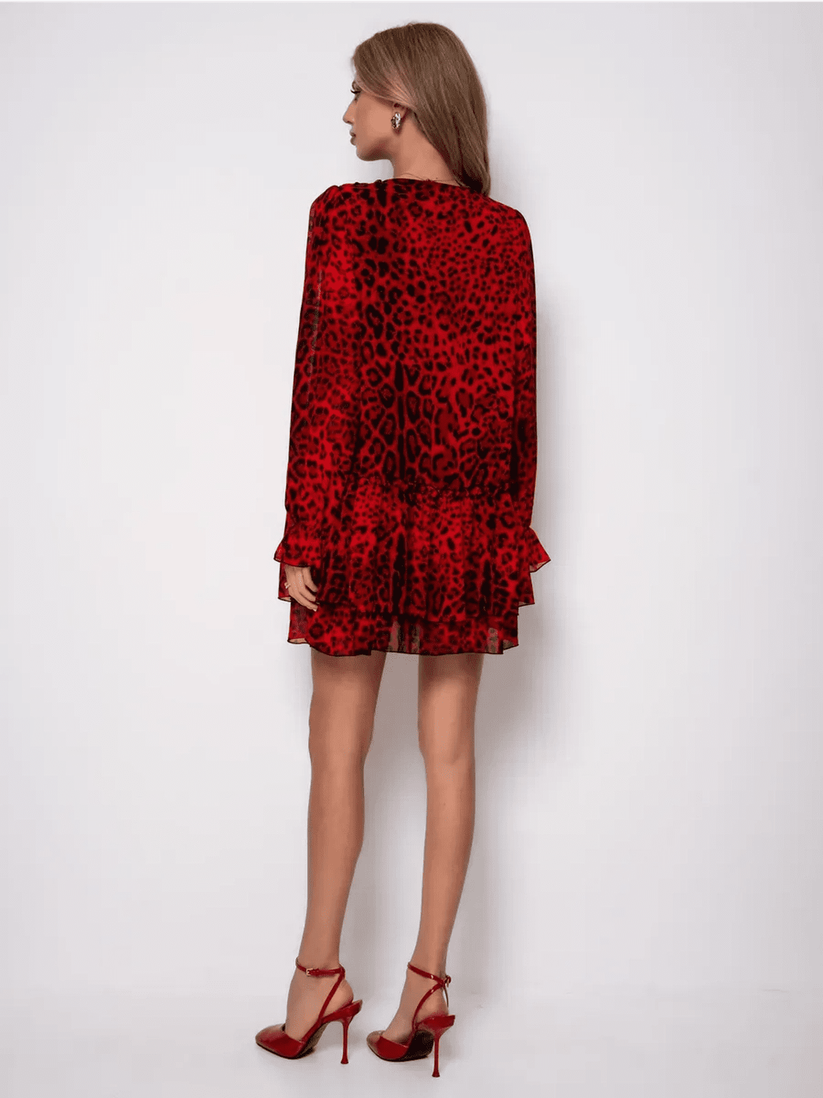 Savanna Mini Dress by Lauven featuring a red leopard print chiffon design from the back, perfect for bold elegance.