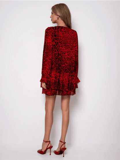 Savanna Mini Dress by Lauven featuring a red leopard print chiffon design from the back, perfect for bold elegance.